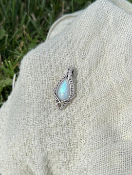 Aurora's Embrace - Rainbow Moonstone Sterling Silver Wire Wrapped Pendant